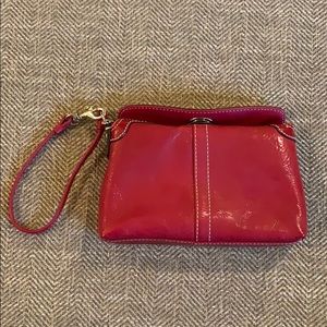red Coach leather wristlet